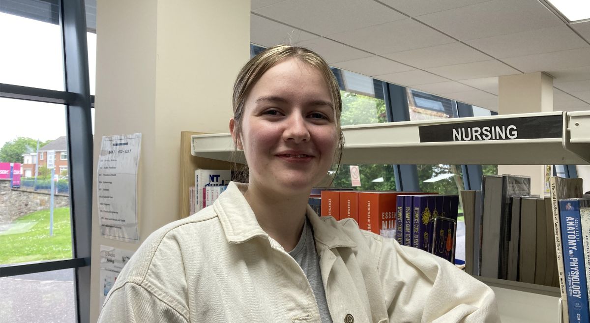 Brooke Morgan pictured in Newtownards Campus Library at the Nursing section